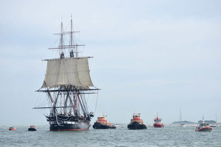 Whole fleet of ships on the water in Boston