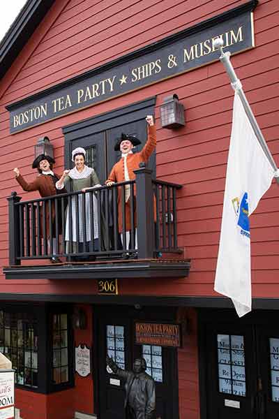 reenactors outside of the boston tea party ships and museum